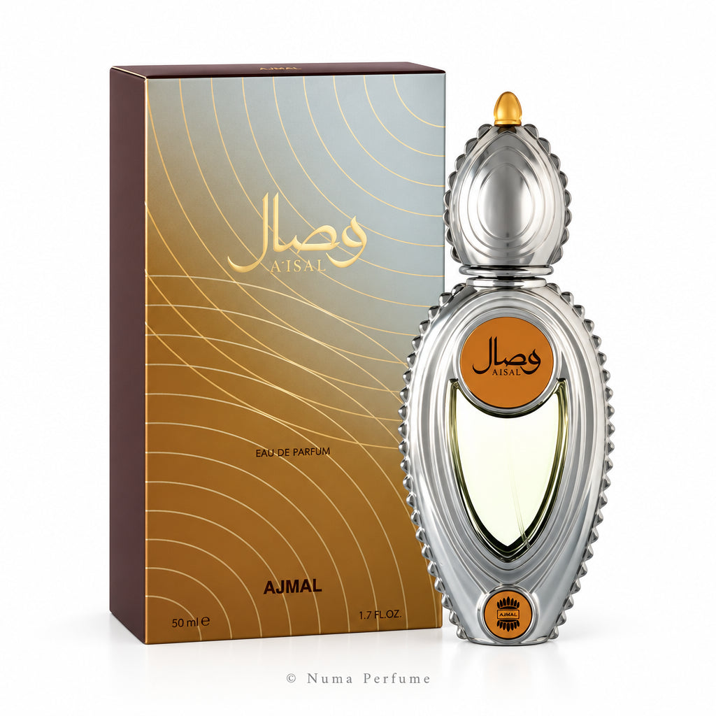 Ajmal Waisal Eau de Parfum bottle and its packaging box. The bottle is metallic silver with a textured, scalloped edge and a gold cap, featuring an orange circular label with Arabic calligraphy.