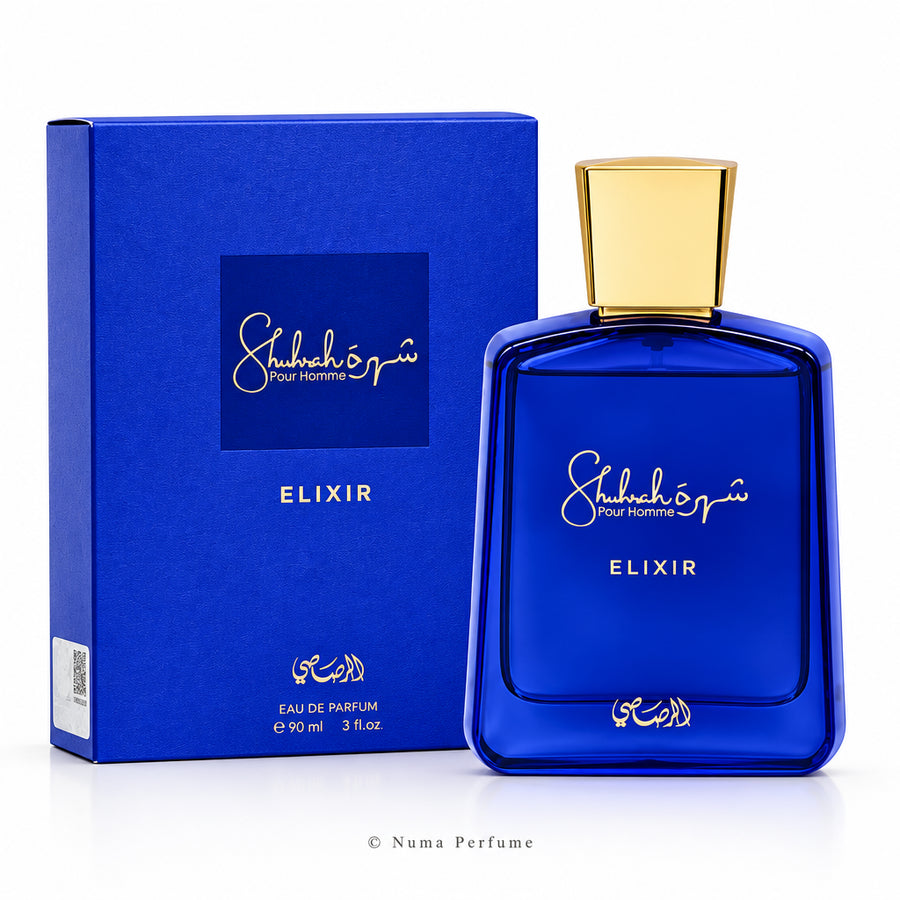 Shubhairi Elixir Eau De Parfum 90ml bottle with a gold cap next to its blue packaging box, on a white background.