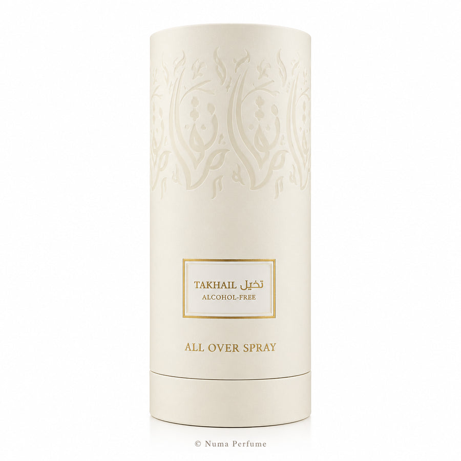 A tall, cylindrical off-white cardboard packaging container for Takhal All Over Spray, featuring embossed floral patterns and a central gold-bordered label with Arabic and English text.