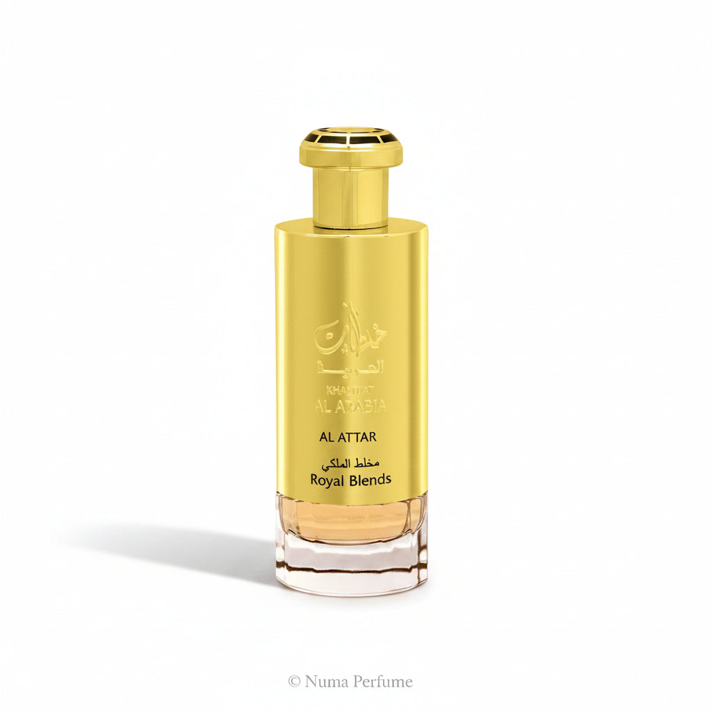 A bottle of Royal Blends perfume by Khair Al Arabia, featuring a shiny gold metallic cylindrical bottle with a matching gold cap and a clear glass base showing amber liquid inside, set against a plain white background.