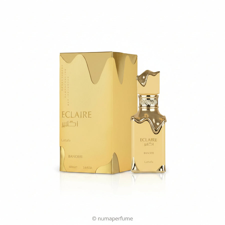 Eclair by Banoffi perfume bottle and matching box in a metallic gold color, set against a plain white background.