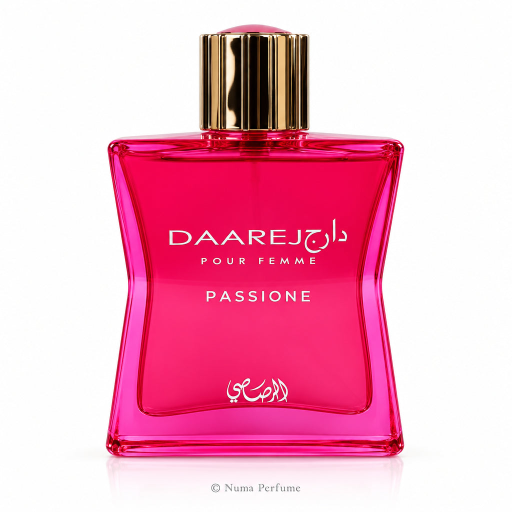 A vibrant pink perfume bottle with a metallic gold cap, labeled 'DAAREJ POUR FEMME PASSIONE'.