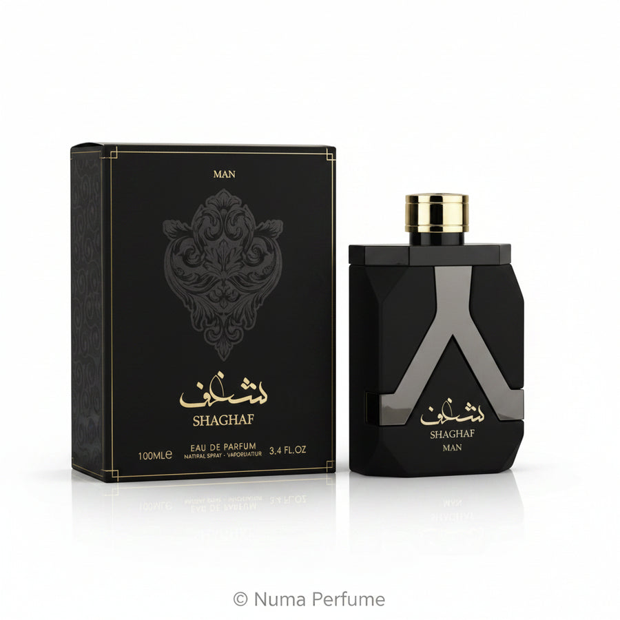 Shaghaf Man Eau de Parfum bottle and its black packaging box, featuring a faceted black design with a metallic silver 'A' motif and gold lettering.